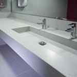 Silestone Bathroom Collection - Walls and Floor in Blanco Rivers and Sink in Lagoon Suede Finish